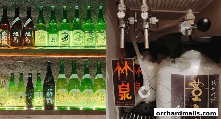 A display of various sake bottles on shelves and a beer tap system with kegs.