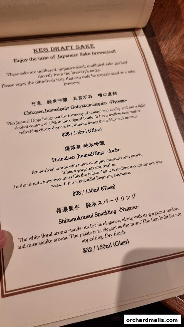 A menu page showcasing different types of Japanese sake with descriptions and prices.