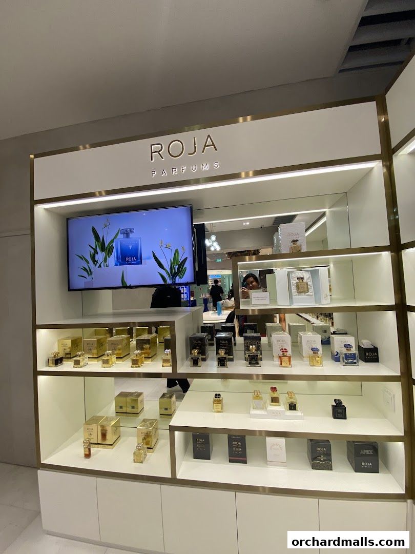 A display of luxury perfumes from Roja Parfums in a well-lit retail setting.