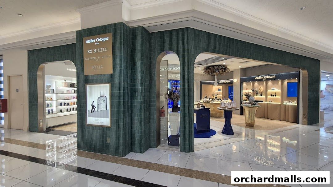 A luxury perfume boutique showcasing brands like Atelier Cologne, Ex Nihilo, Parfums De Marly, and Roja.