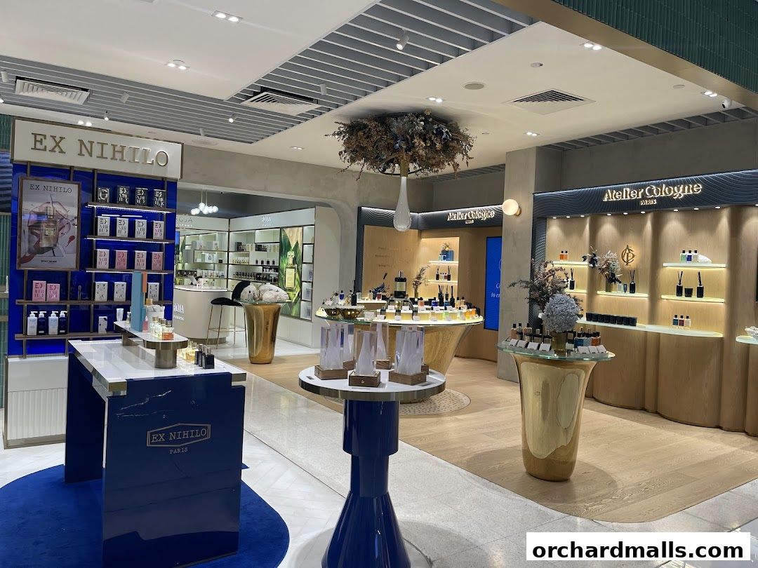 Interior view of a luxury perfume boutique showcasing brands like Ex Nihilo and Atelier Cologne.