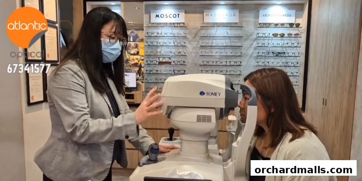 Optician performing an eye examination with specialized equipment.