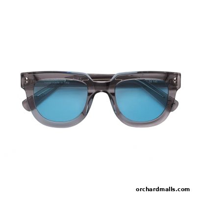 A pair of stylish grey-framed sunglasses with bright blue lenses.