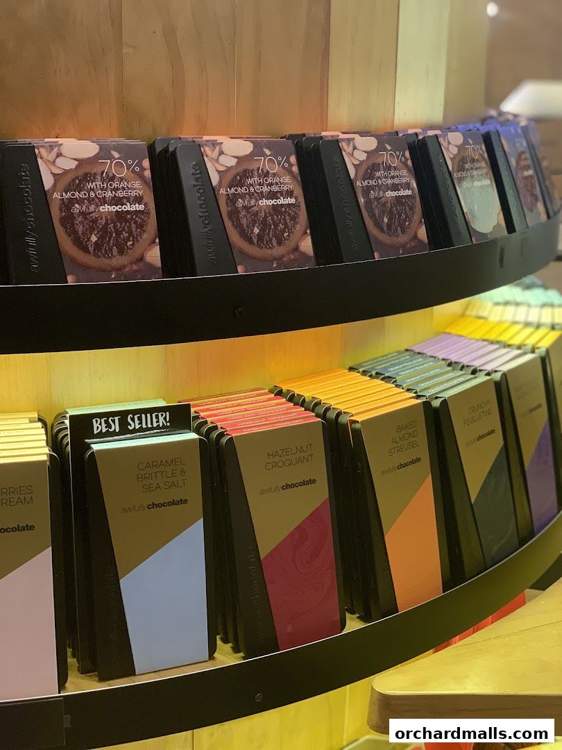 A display of assorted chocolate bars with various flavors and packaging.