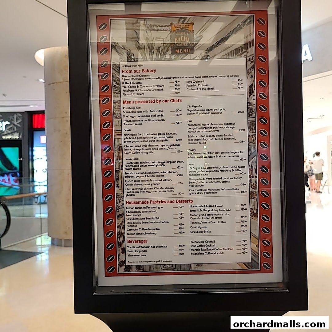 A menu board for Bacha Coffee, showcasing a variety of food and beverage items.