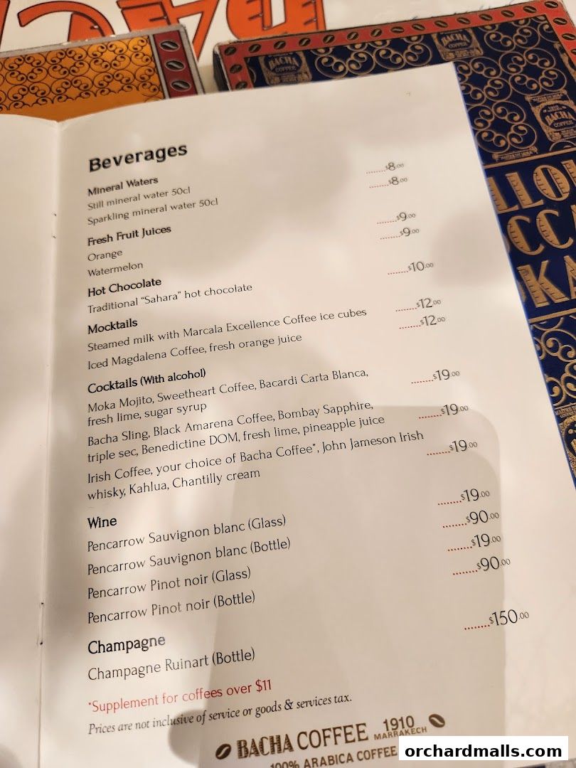 A menu from Bacha Coffee featuring a variety of beverages including mineral waters, juices, mocktails, cocktails, wine, and champagne.