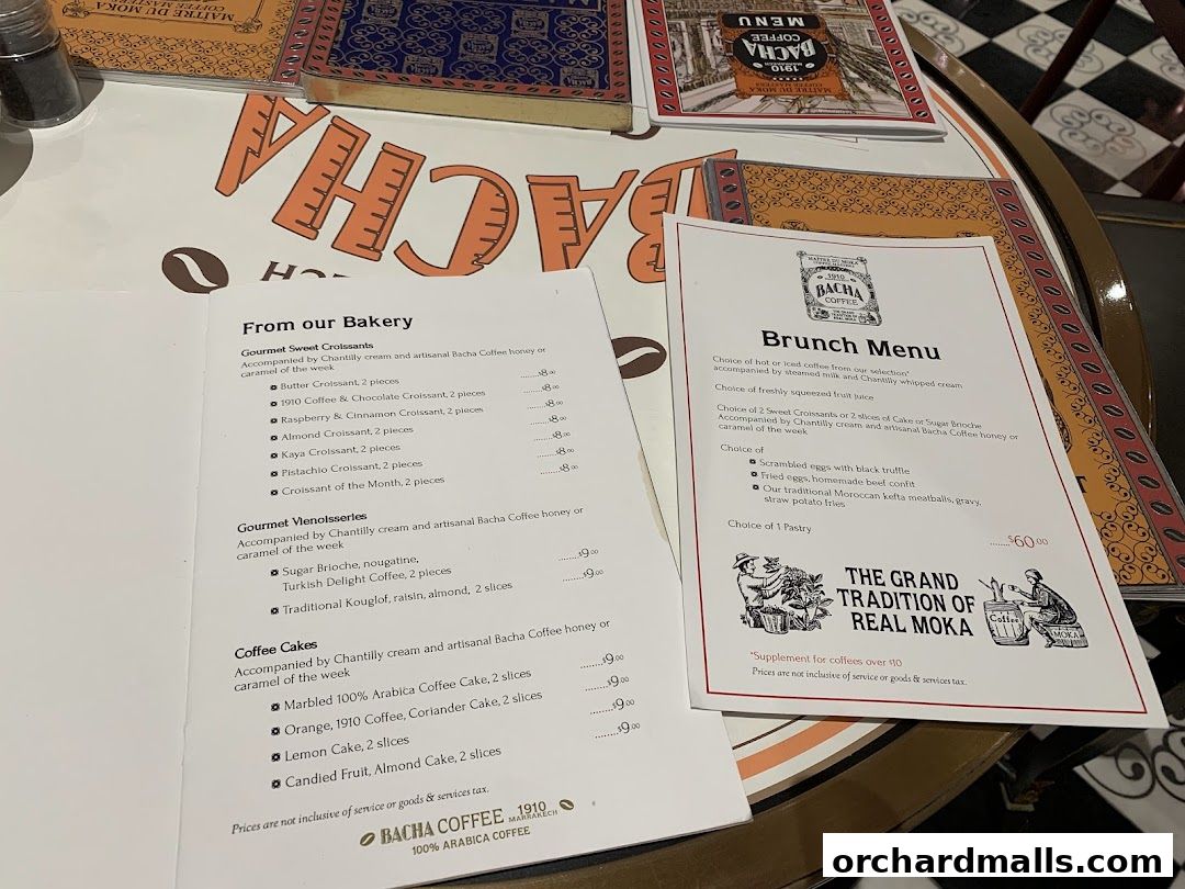 A menu from Bacha Coffee featuring bakery items, viennoiseries, coffee cakes, and a brunch menu.