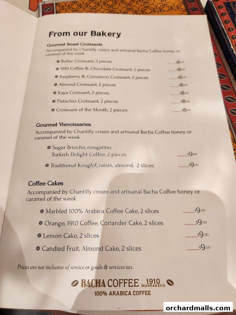 A menu from Bacha Coffee featuring bakery items like croissants, viennoiseries, and coffee cakes.