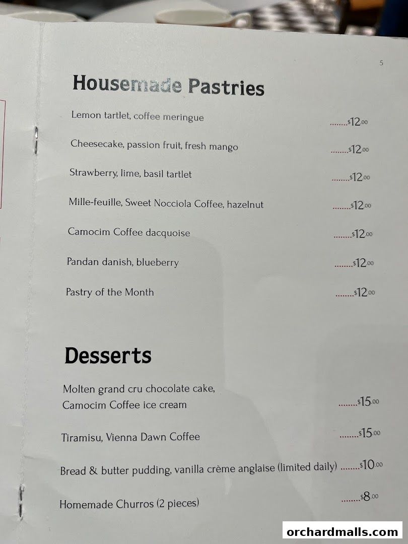 A menu from Bacha Coffee featuring housemade pastries and desserts with prices.