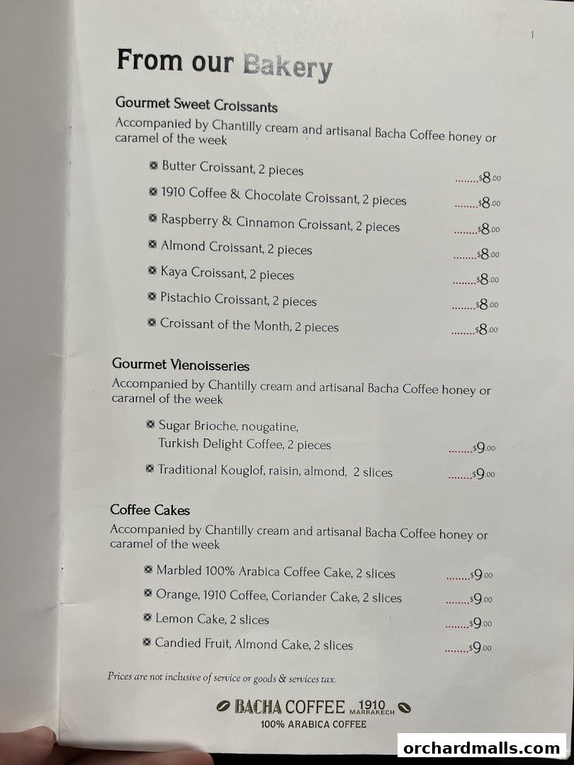 A menu from Bacha Coffee featuring bakery items like croissants, viennoiseries, and coffee cakes.
