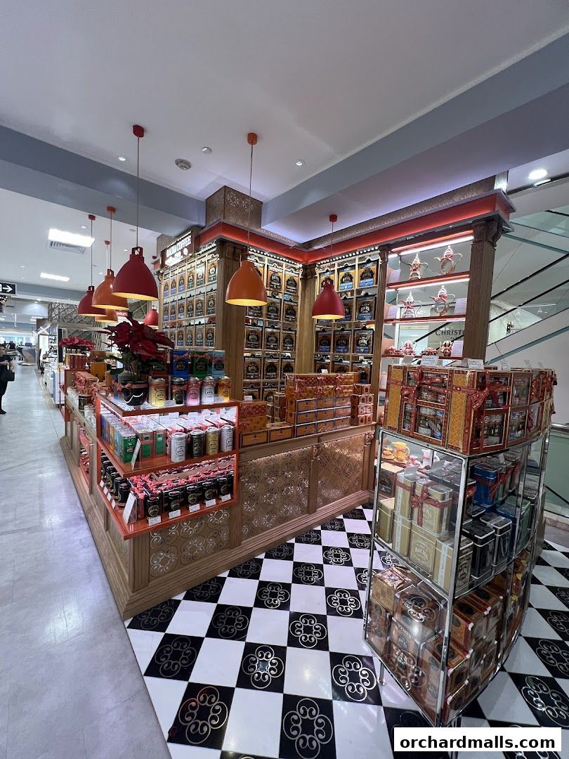A Bacha Coffee shop interior with shelves stocked with coffee and tea products.