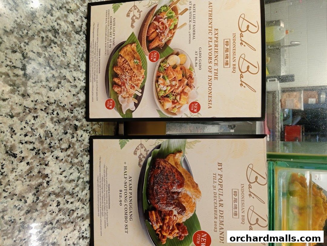 A menu display for Bali Bali Indonesian BBQ featuring popular dishes like Sate Lilit and Ayam Panggang.