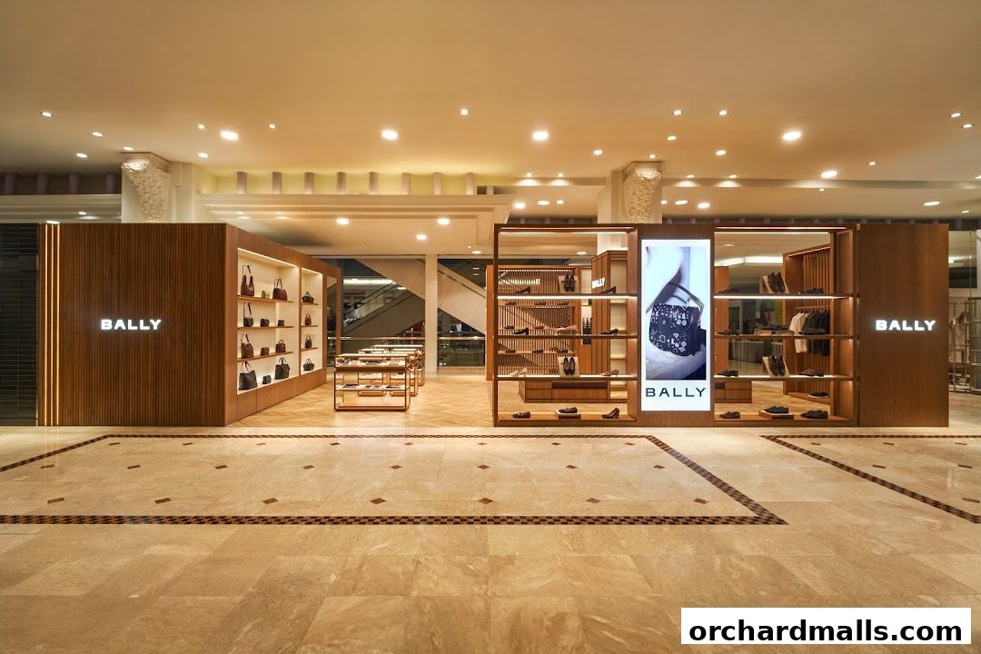 Interior view of a Bally store showcasing handbags and shoes on wooden shelves.