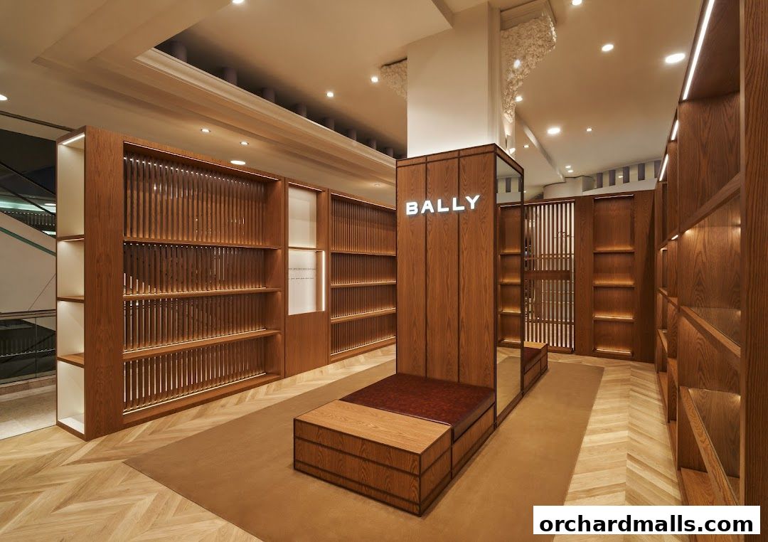 Interior view of a modern Bally store with wooden shelves and seating.