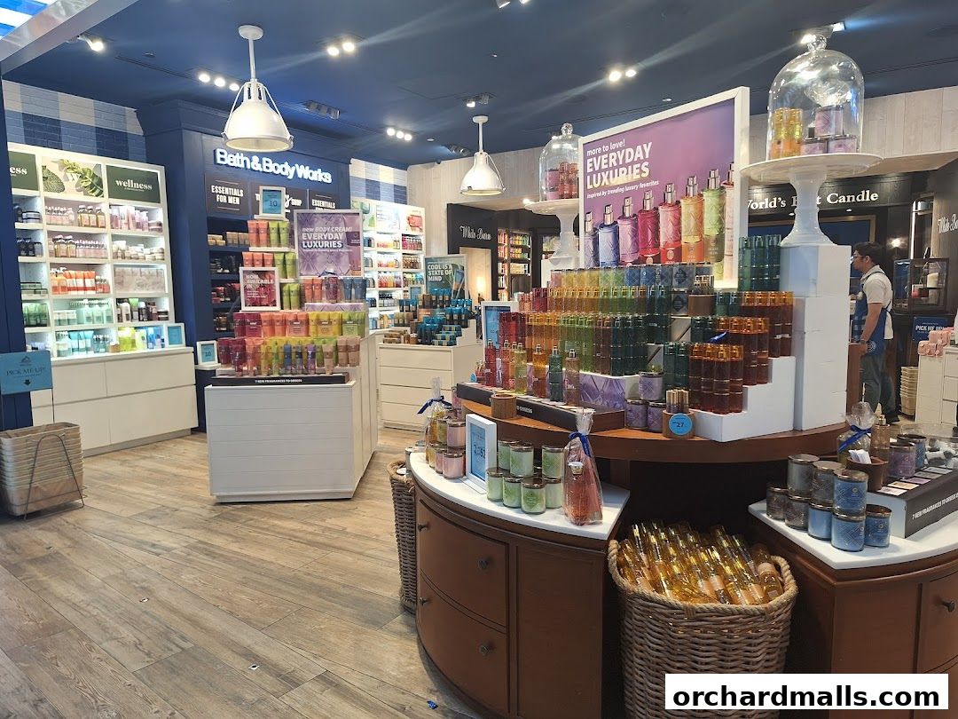 Interior view of a Bath & Body Works store showcasing a wide array of fragrances and candles.