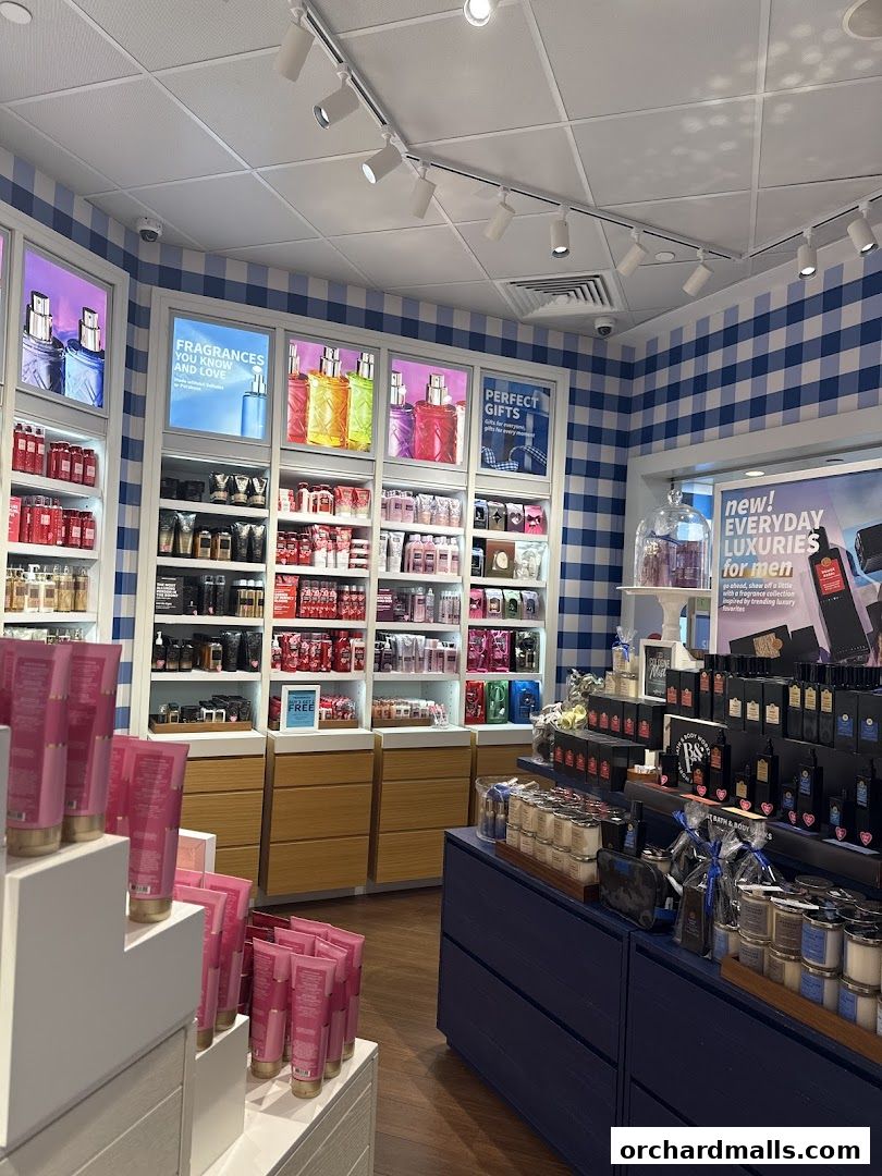 Interior view of Bath & Body Works store showcasing fragrances, lotions, and candles.