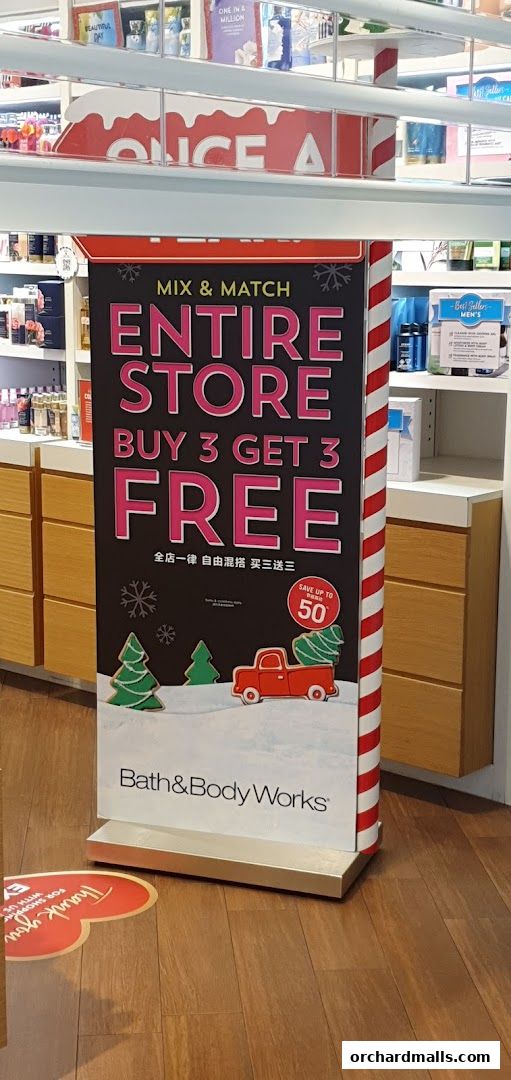 Bath & Body Works sign advertising a 'Buy 3 Get 3 Free' sale.