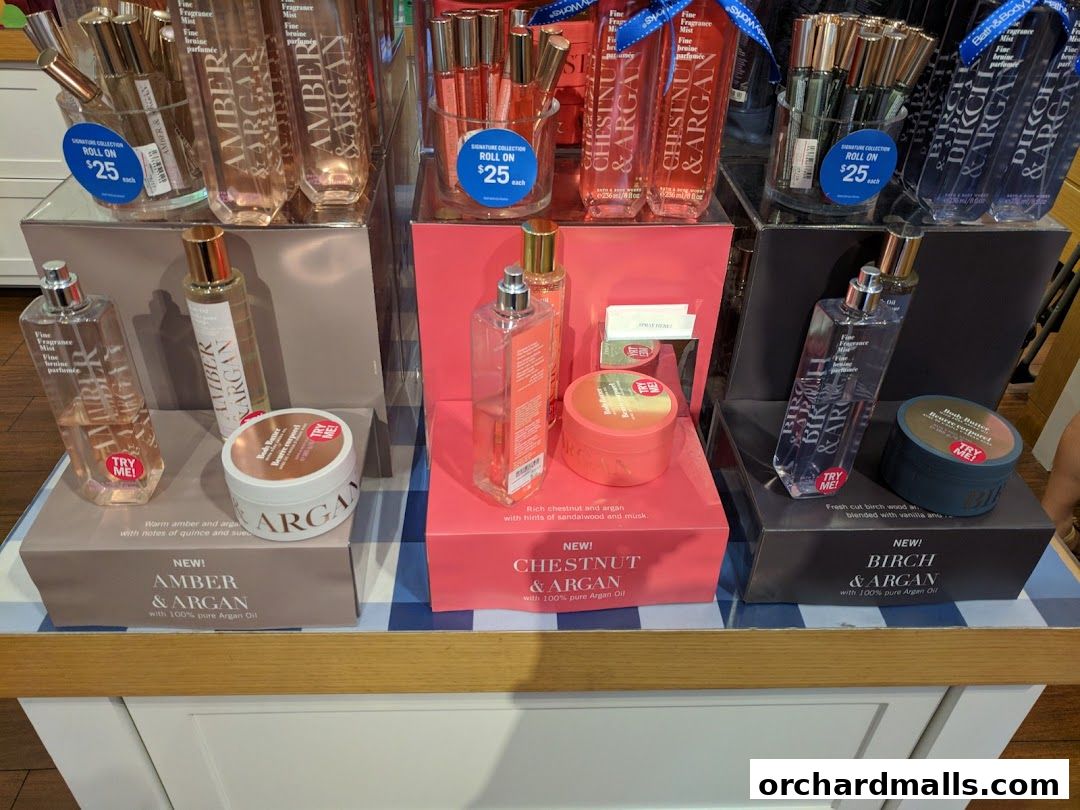 Display of Bath & Body Works fine fragrance mists and body butters in various scents.