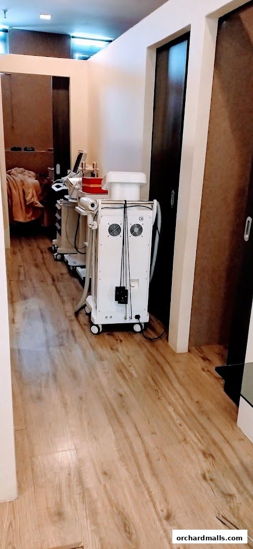 Interior view of a beauty clinic with advanced skincare equipment.