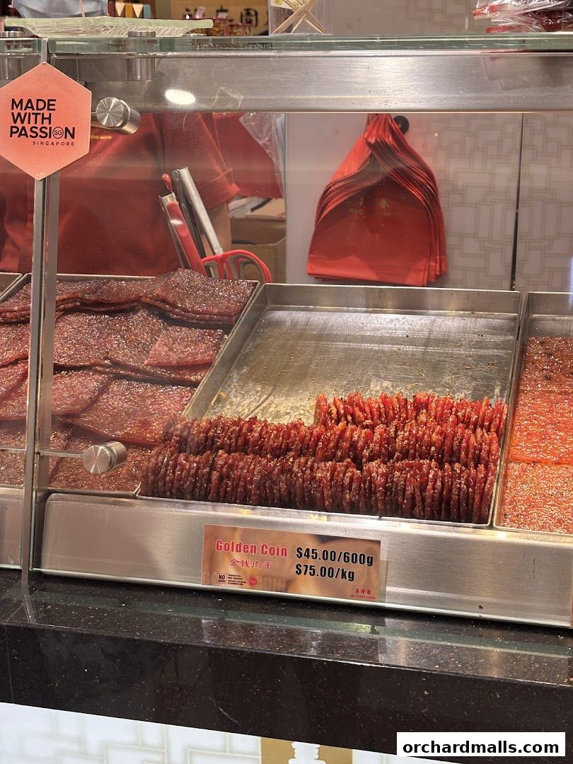 Display of delicious bak kwa and other meat products at Bee Cheng Hiang.