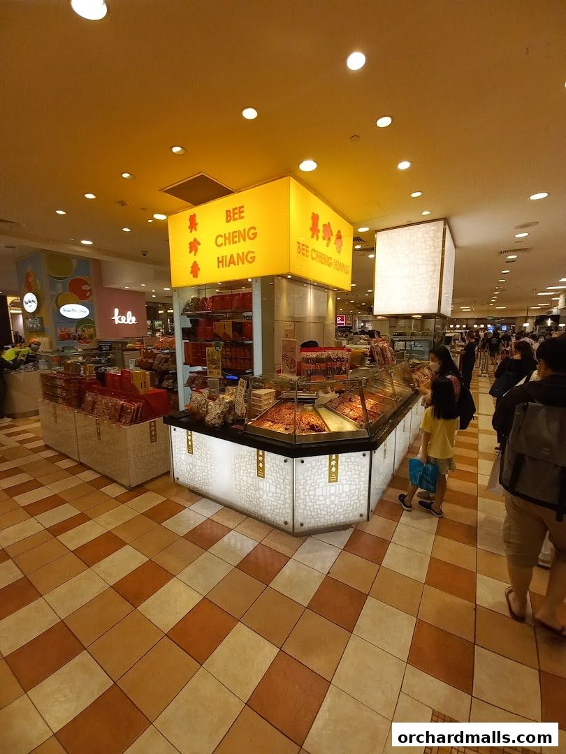 A Bee Cheng Hiang store display with various meat products and packaging.