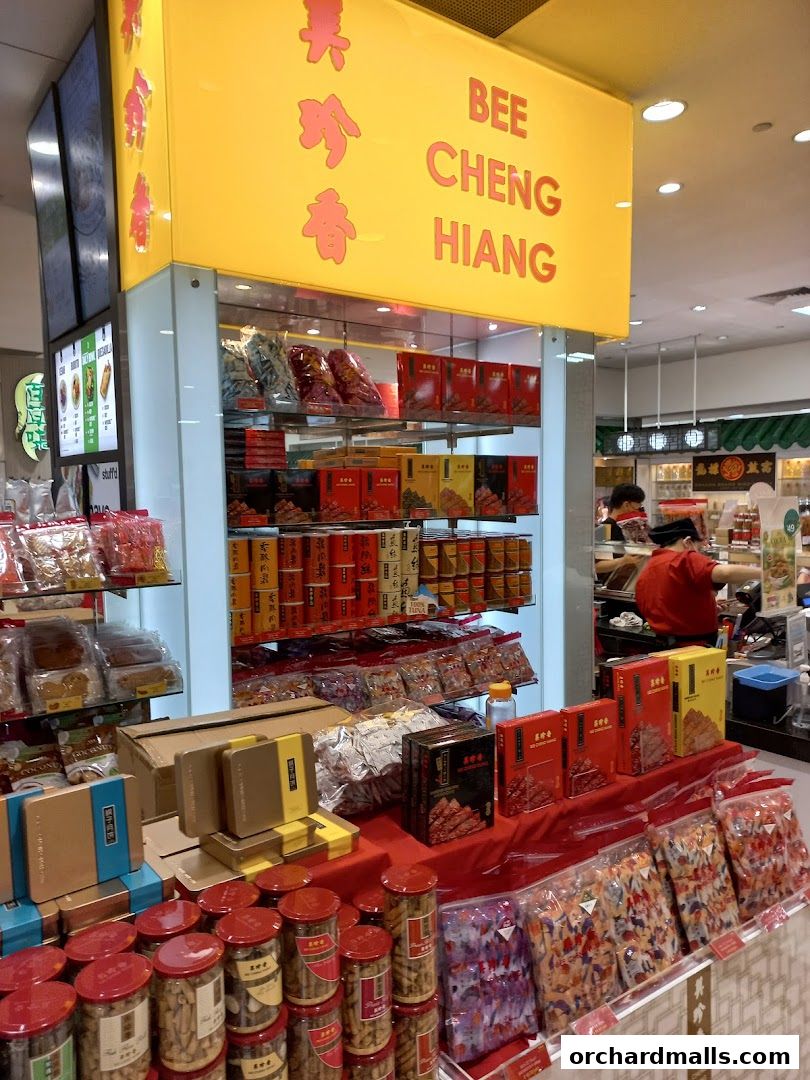 Bee Cheng Hiang shop displaying various dried meat and snack products.