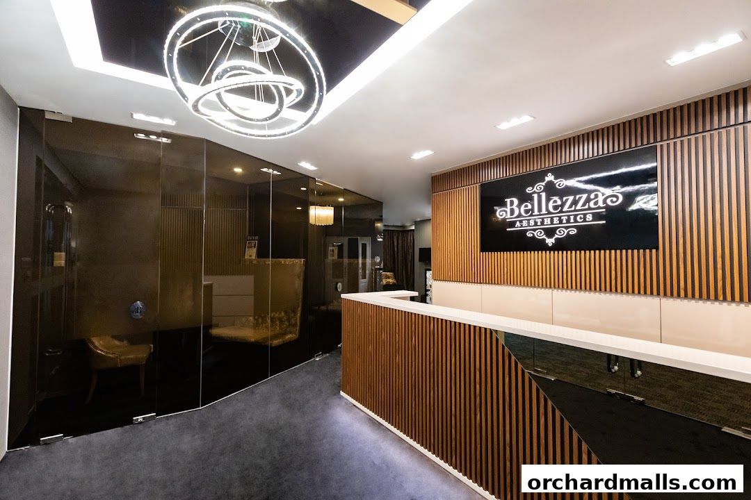 Interior of Bellezza Aesthetics with a reception desk and modern lighting.