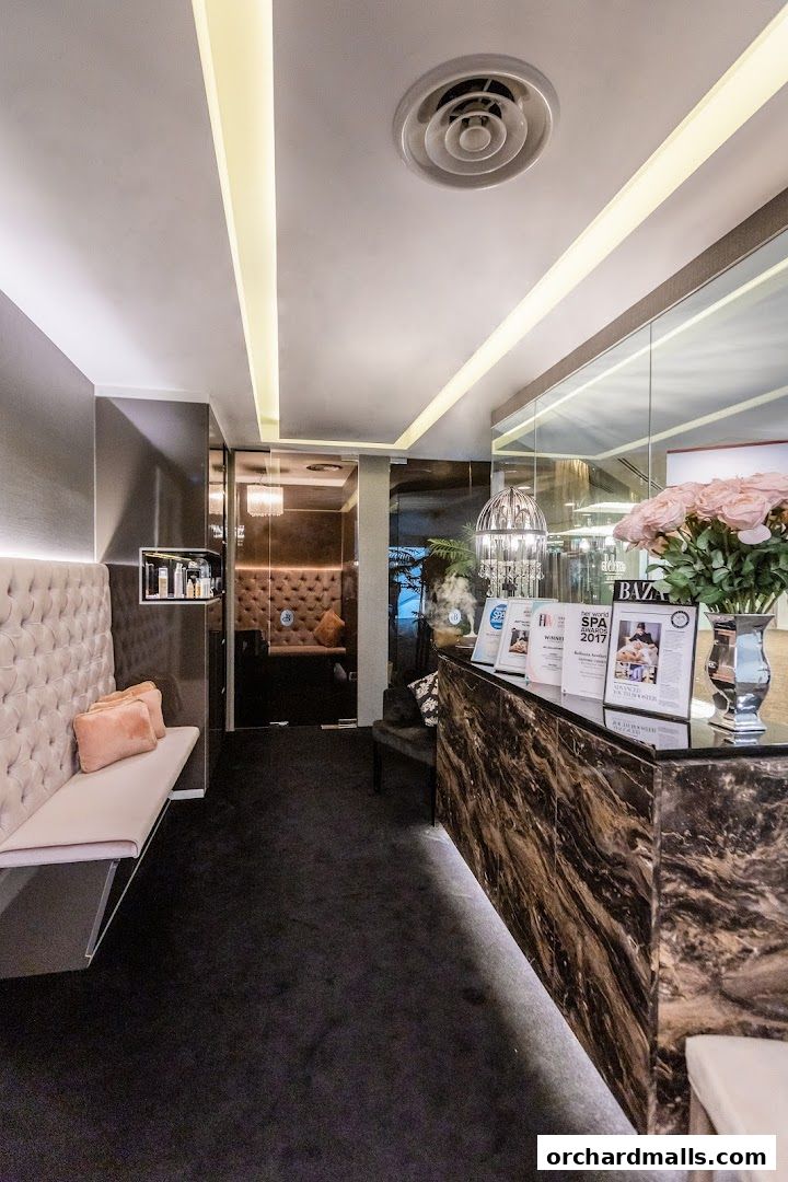 Interior of Bellezza Aesthetics, featuring a reception desk, waiting area, and treatment rooms.