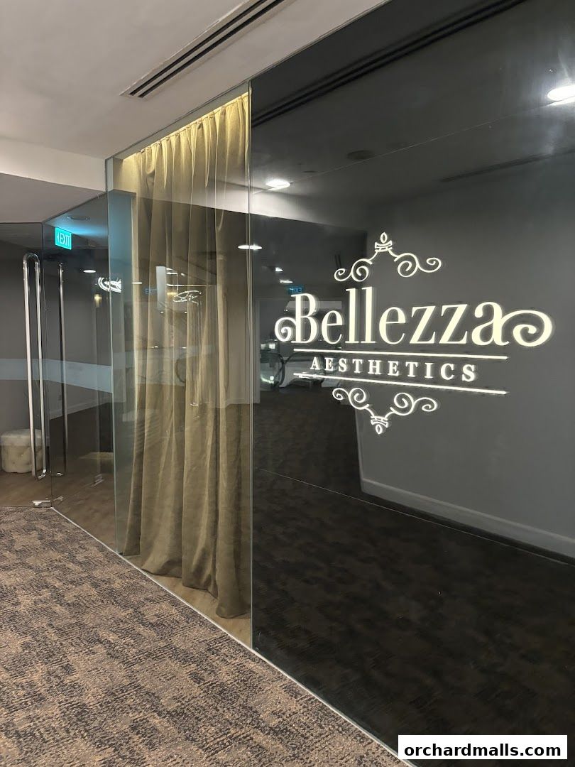 Entrance to Bellezza Aesthetics with elegant branding on glass doors.