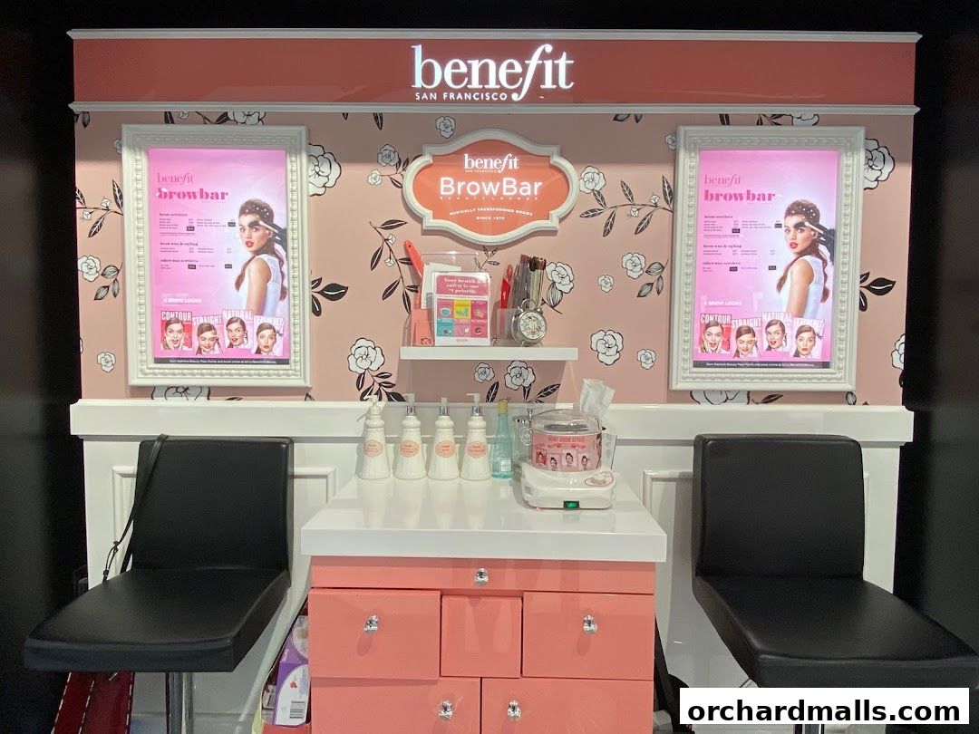 Benefit Cosmetics Brow Bar interior with styling chairs and brow service menu displays.