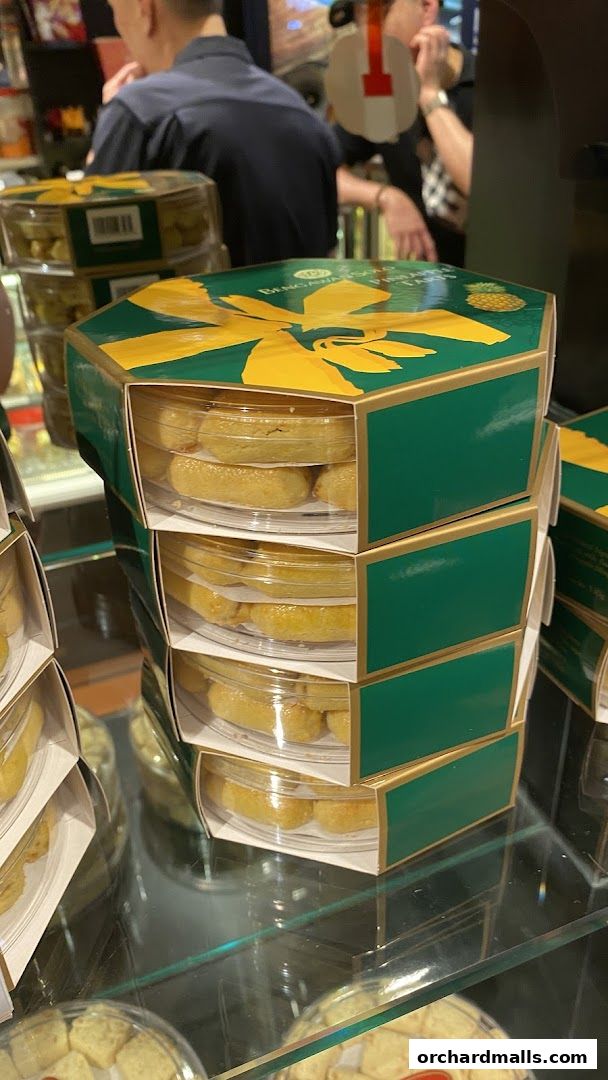 Stacks of hexagonal boxes filled with pineapple tarts from Bengawan Solo.