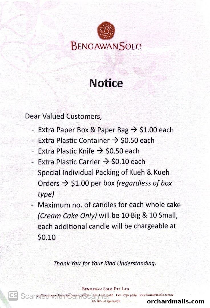A notice from Bengawan Solo detailing charges for extra packaging and candles.