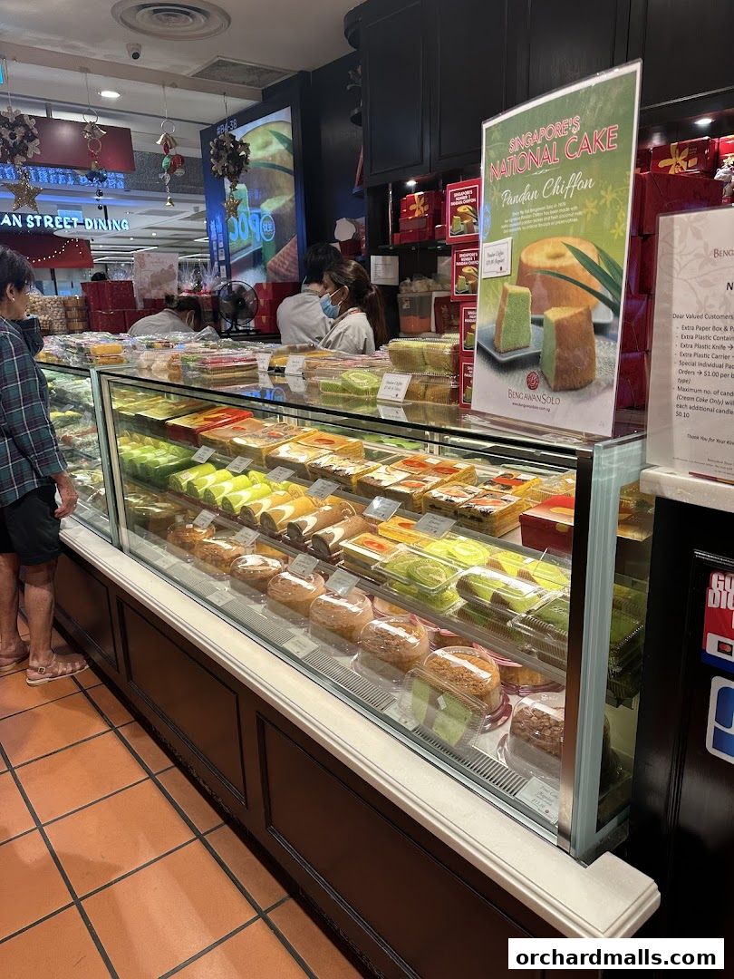 A display case filled with various cakes and pastries at Bengawan Solo.