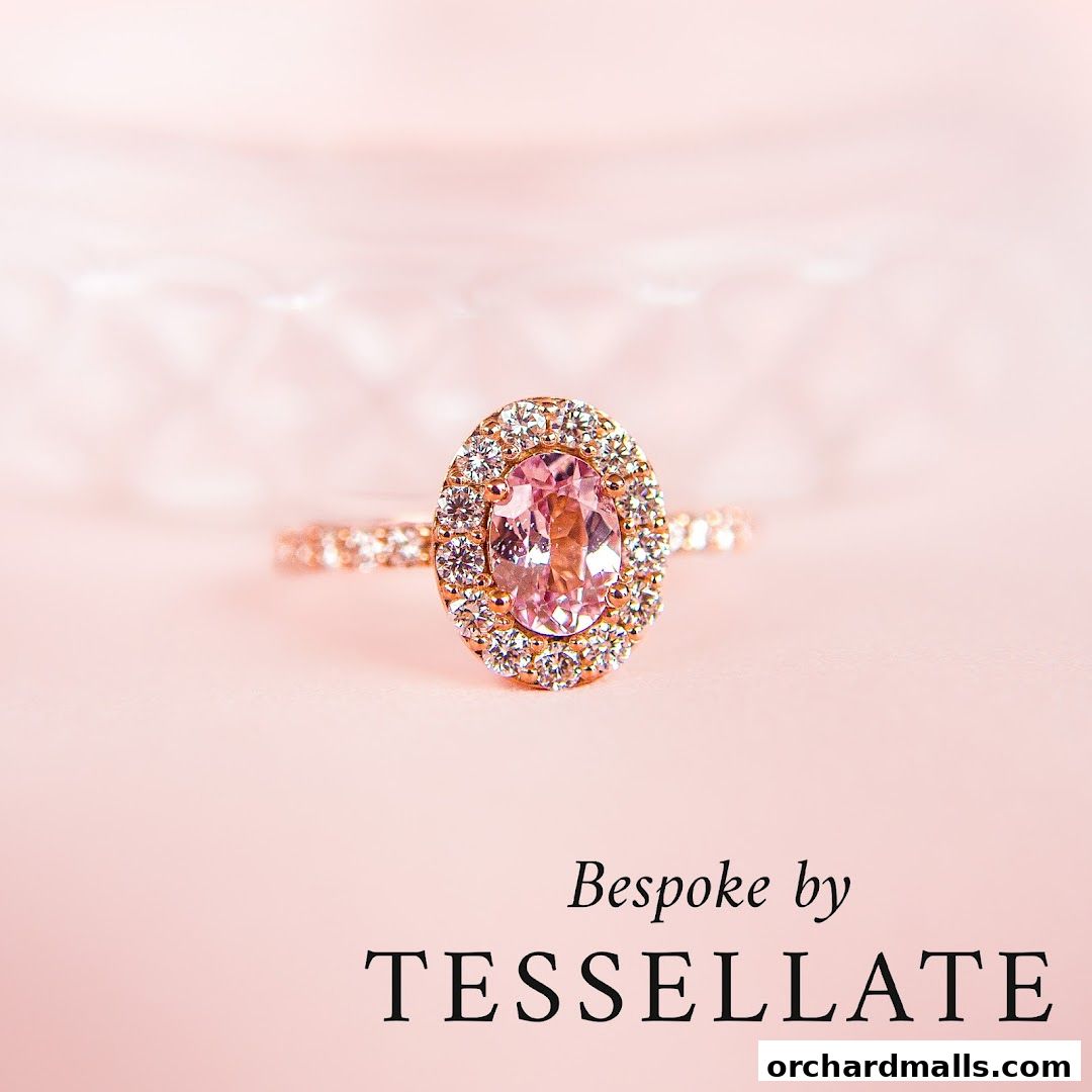 A close-up of a pink gemstone ring with diamonds, with the shop name 'Bespoke by Tessellate' below.