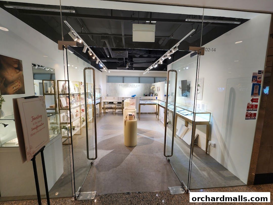 Entrance to Bespoke By Tessellate, a jewelry store with display cases and elegant lighting.