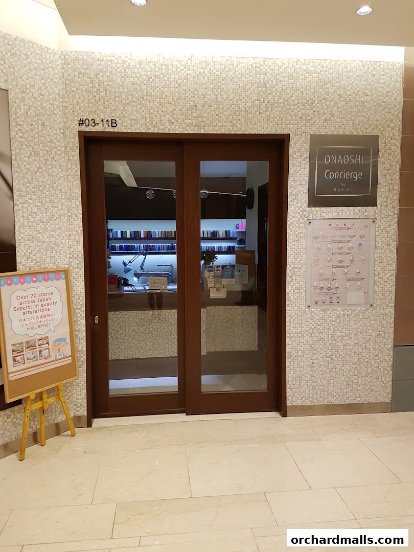 Entrance to Big Mama Ngee Ann City, a laundry and dry cleaning service.