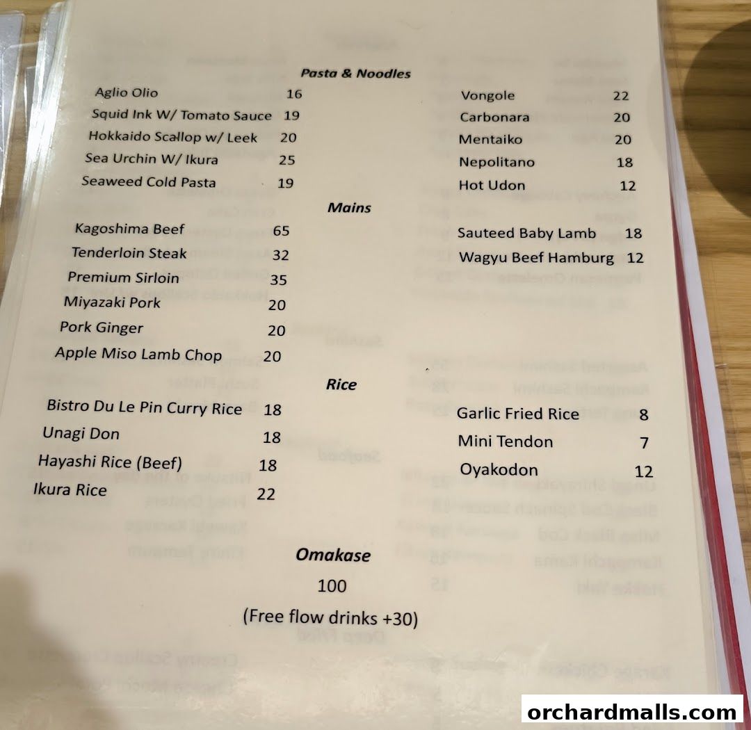A menu from Bistro Du Le Pin featuring pasta, mains, rice dishes, and omakase.