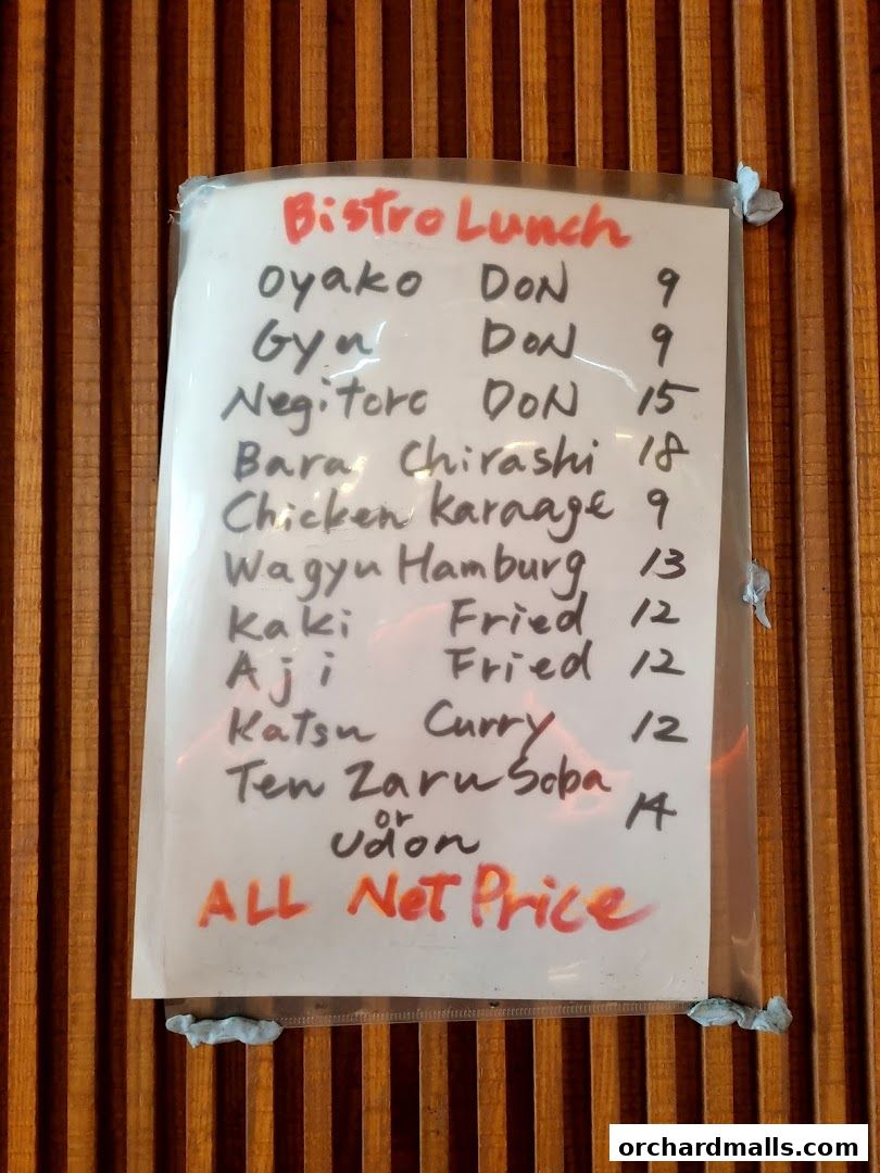 A handwritten menu for Bistro Du Le Pin, featuring lunch specials and prices.