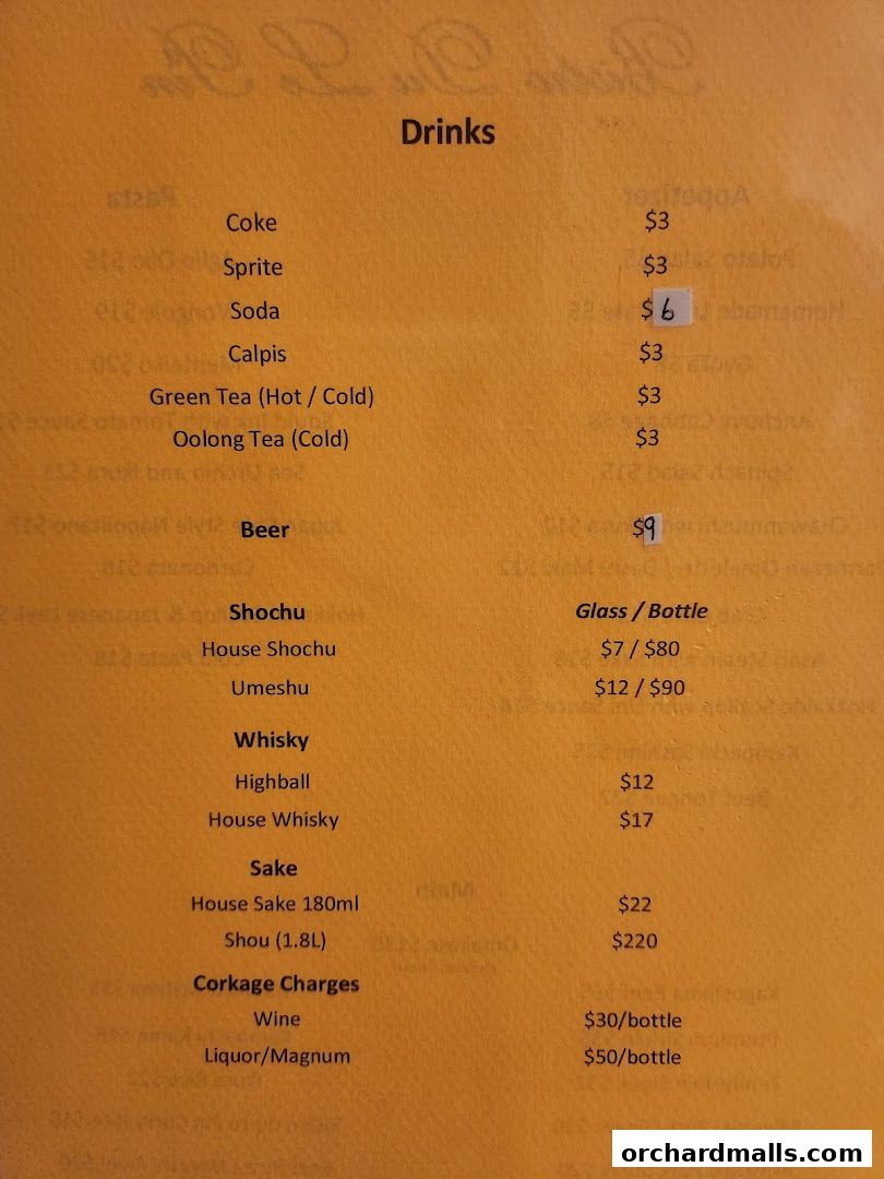 A menu listing various drinks including sodas, teas, beer, shochu, whisky, and sake.