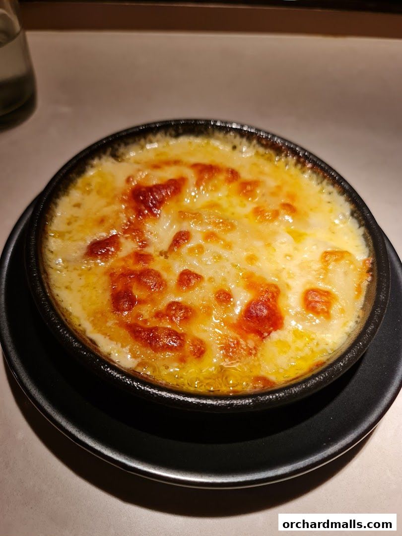 A close-up shot of a delicious baked dish with melted cheese.