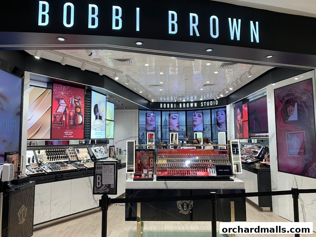 The Bobbi Brown store features a well-lit interior showcasing makeup products and promotional displays.