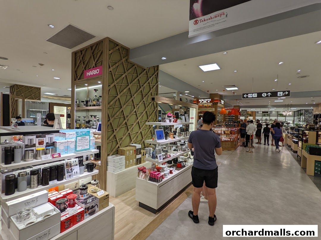 Interior view of a Bodum store showcasing coffee makers, mugs, and other kitchenware.