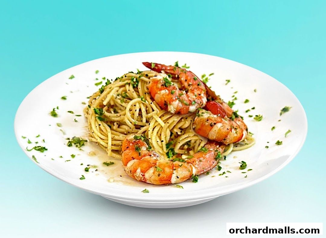 A white plate of spaghetti with grilled shrimp and parsley, against a blue gradient background.