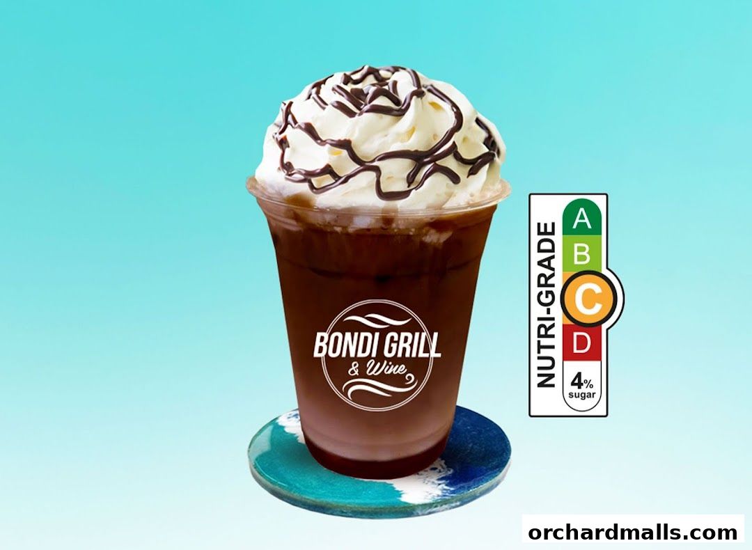 A decadent chocolate drink with whipped cream and chocolate drizzle from Bondi Grill & Wine.