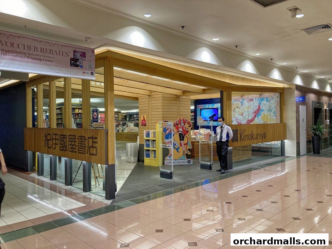 The entrance of Books Kinokuniya Singapore Main Store, featuring Japanese signage and promotional banners.