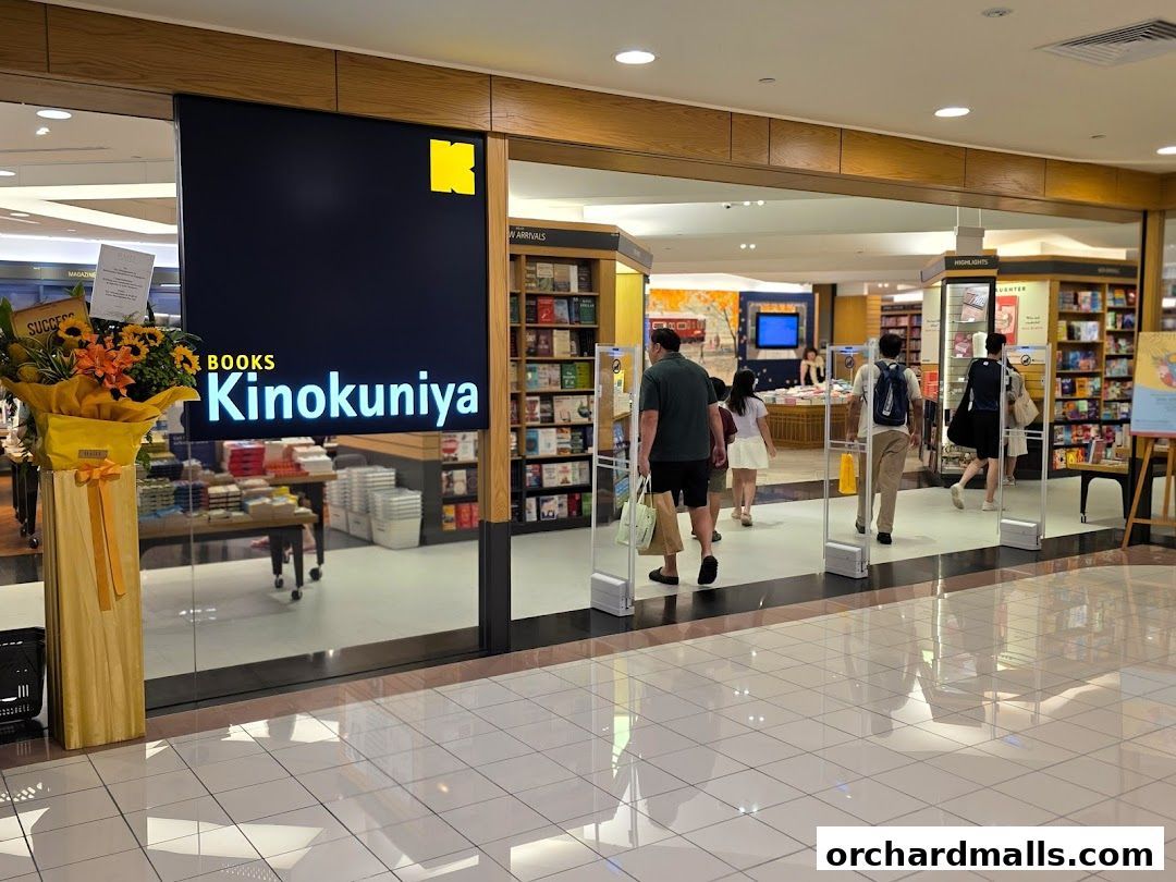 The entrance to Books Kinokuniya Singapore Main Store, with customers entering.