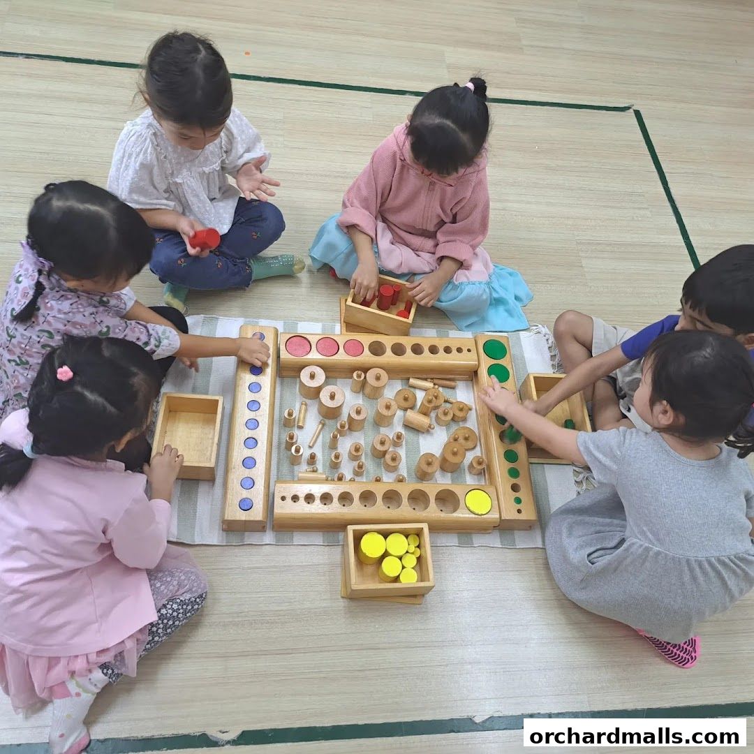 Children engage in a hands-on learning activity with Montessori materials.