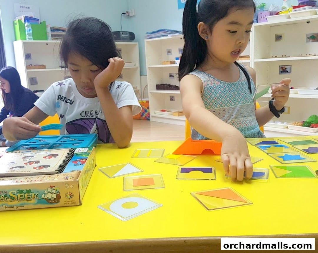 Children engaged in a learning activity with colorful geometric shapes and a game.