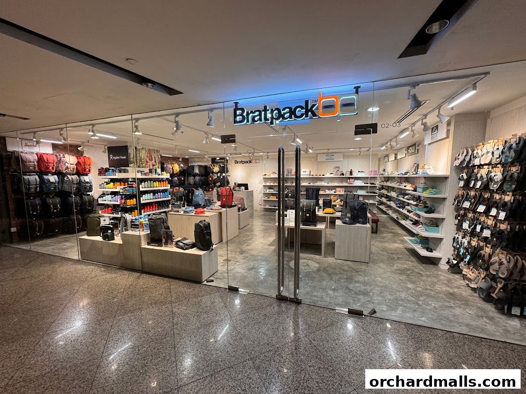 Bratpack Wheelock Place shop interior showcasing a wide selection of backpacks, bags, and footwear.