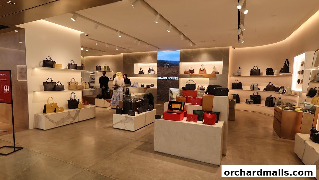 Interior view of a Braun Büffel store showcasing a wide selection of handbags and accessories.